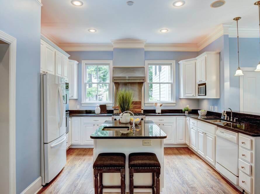Large American style kitchen interior with granite countertops