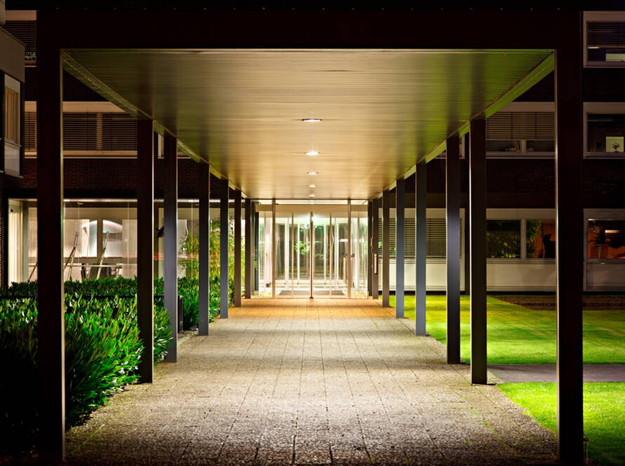 Roofed Office Building Entrance At Night